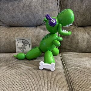 Squeaker the Balloon Dino. He’s a stompin’, chompin’ balloon dinosaur.